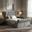 [Single | Dark Grey] Side view of Chesterfield ottoman bed with buttoned grey velvet headboard and scroll footboard