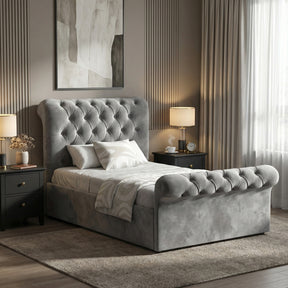 [Single | Dark Grey] Side view of Chesterfield ottoman bed with buttoned grey velvet headboard and scroll footboard