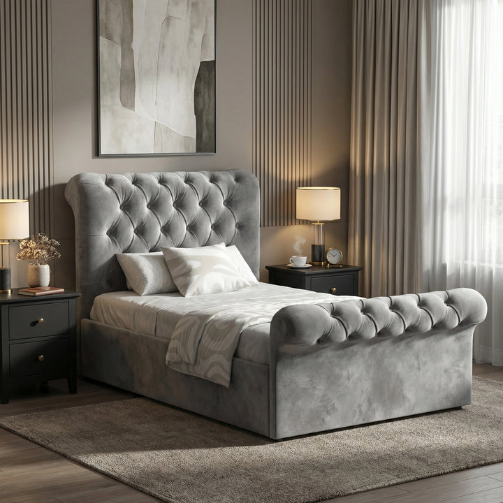 [Single | Dark Grey] Side view of Chesterfield ottoman bed with buttoned grey velvet headboard and scroll footboard