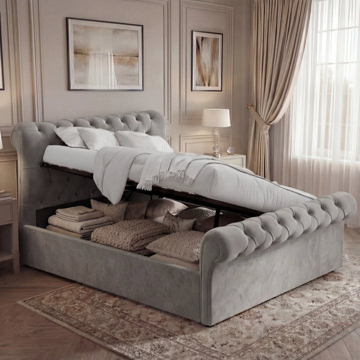 [Double | Grey] Chesterfield ottoman bed side angle with deep button-tufted scroll headboard in soft velvet