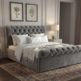 [Small Double | Dark Grey] Chesterfield ottoman bed side angle showing scroll headboard with botanical prints on wall