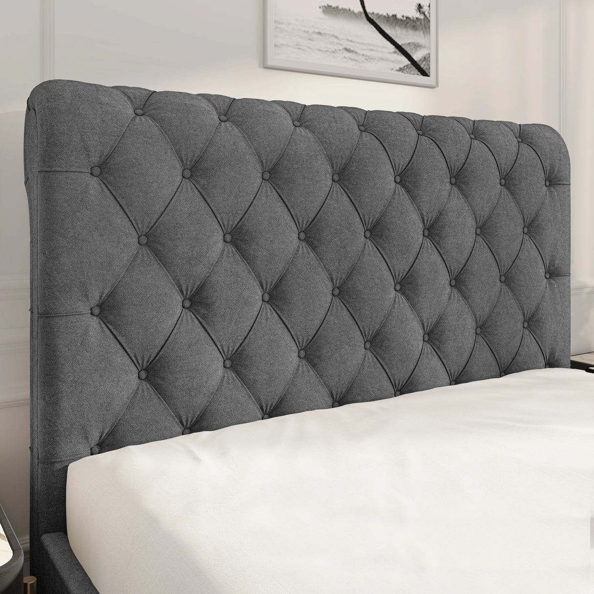 Chesterfield Ottoman Storage Bed with side lift in dark grey fabric featuring a deep button-tufted headboard. Elegant platform bed frame with hidden storage.