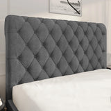 Chesterfield Ottoman Storage Bed with side lift in dark grey fabric featuring a deep button-tufted headboard. Elegant platform bed frame with hidden storage.