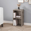 [2 Shelf | Coach Wood] bedside-height coach-wood-grain bookcase tucked beside chair by cream limewash wall