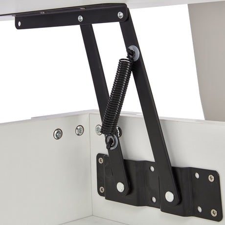 Close-up of lift mechanism for coffee table with spring and metal brackets