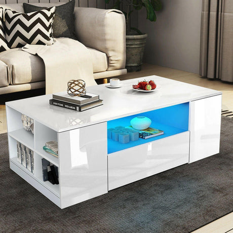 Modern white coffee table with LED lighting and storage shelves for living room decor.