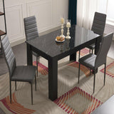 Compact dining set with a sleek design, perfect for small dining spaces or apartments.