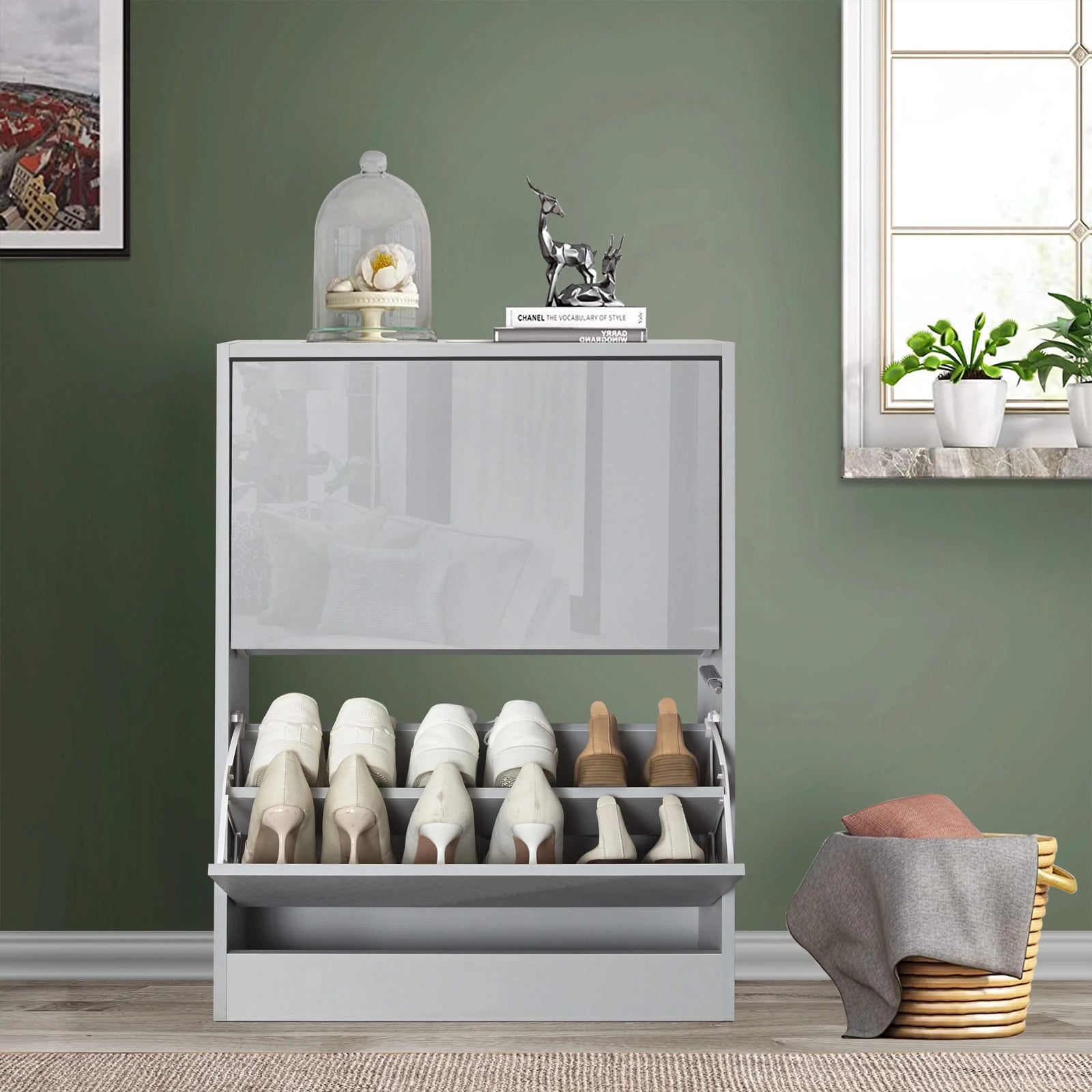 [Silver Grey] front view of grey gloss small shoe cabinet with soft reflection of nearby living room furniture