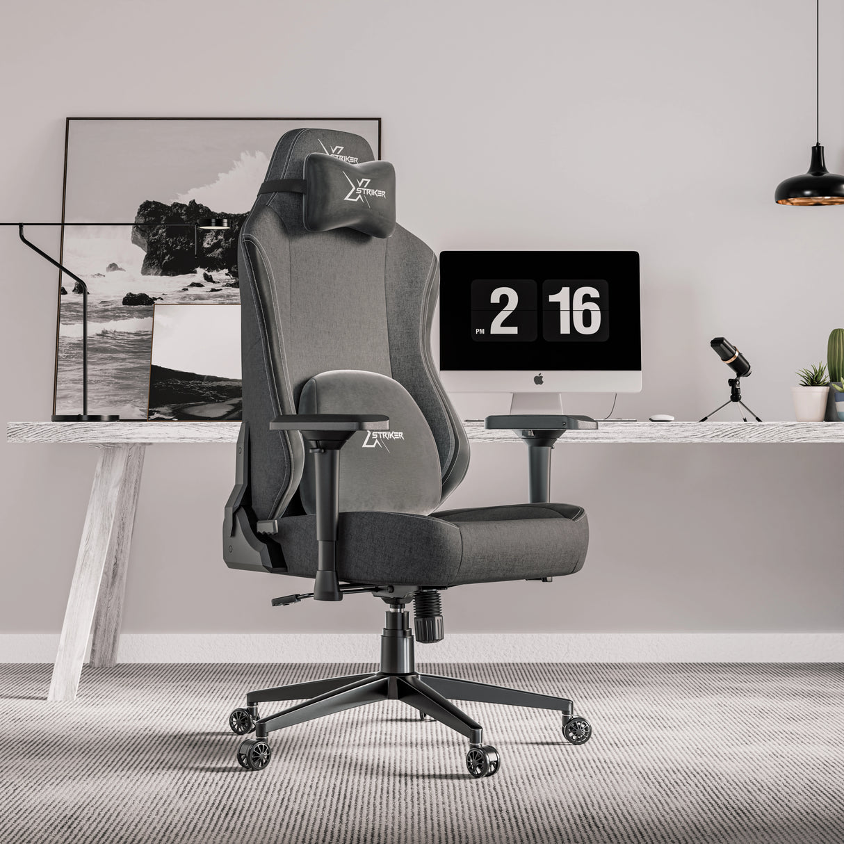 Xstriker Ergonomic Fabric Gaming Chair with 4D Armrest for Adults in a modern home office setup. Features adjustable support and sleek grey fabric.