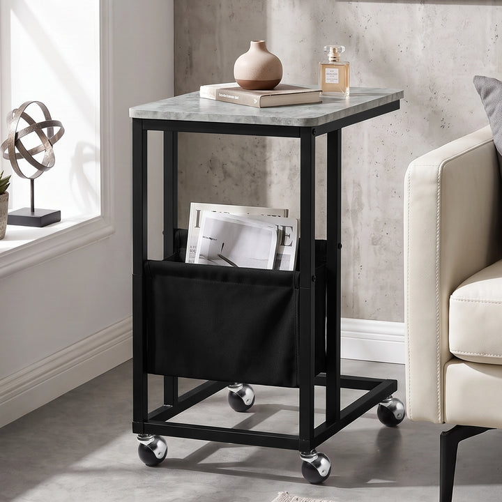 [Concrete] C-shaped side table straight side view with concrete-effect top, pouch and four caster wheels