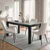[140cm | Concrete] Closed table in bright dining room with four cream chairs, vases, candles, rug, and window light
