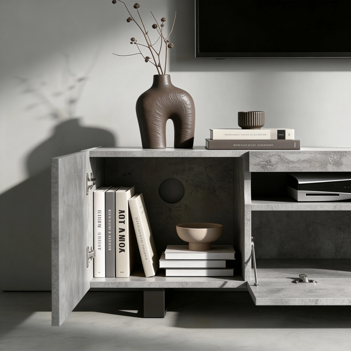 [Concrete] Kystra TV stand left compartment open, dark vase with stems on top and AV gear in centre