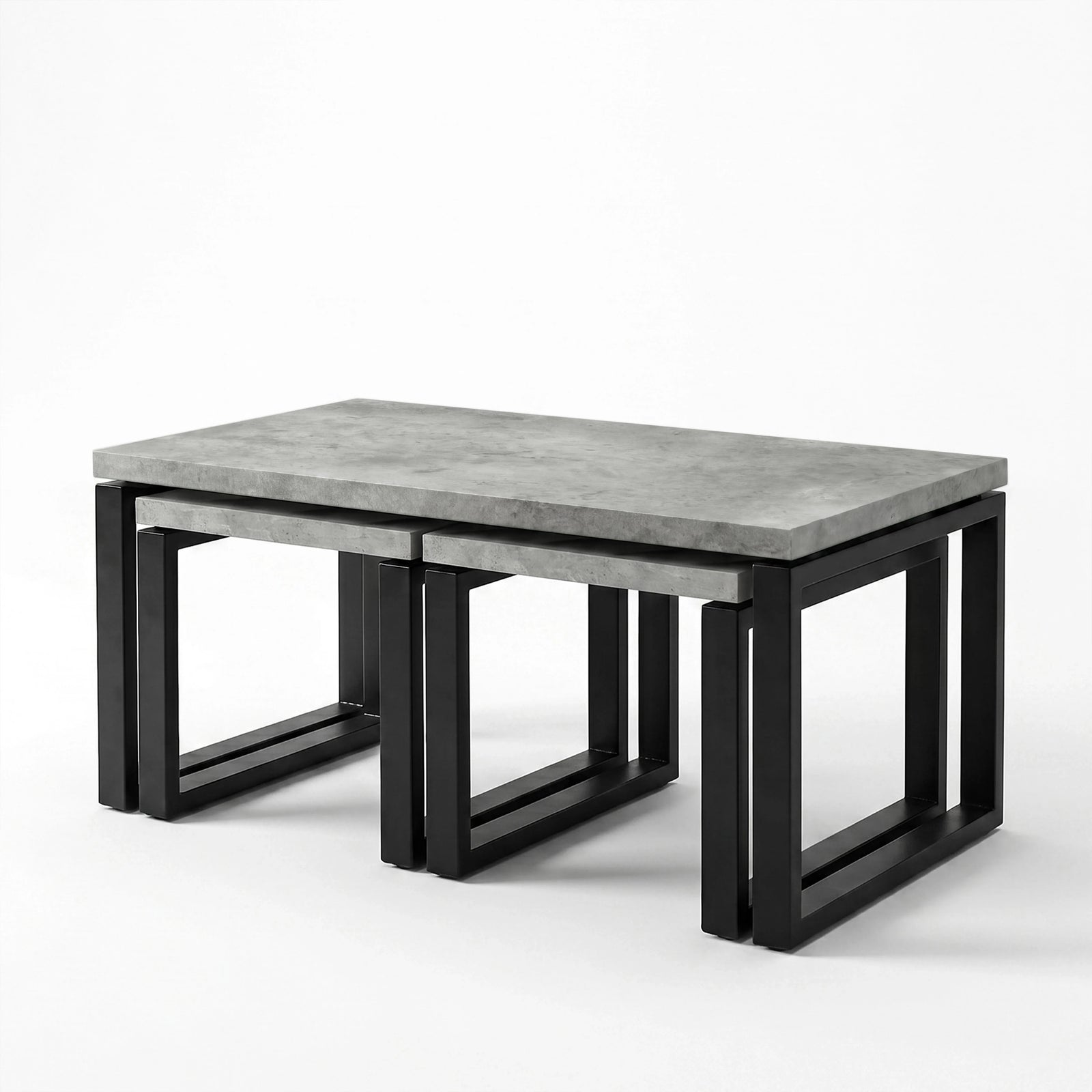[Concrete] Nestline nesting table view showing three-piece nested coffee table set on a clean white background from a side