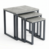 [Concrete] Stackora set of 3 nest of tables in graduated sizes with industrial dark grey metal frames on a white background