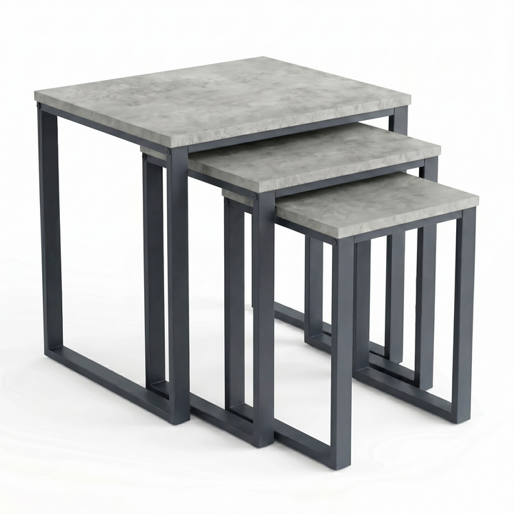 [Concrete] Stackora set of 3 nest of tables in graduated sizes with industrial dark grey metal frames on a white background