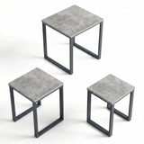 [Concrete] Stackora set of 3 nest of tables shown individually from above at three different heights with dark grey metal loop frames