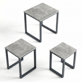[Concrete] Stackora set of 3 nest of tables shown individually from above at three different heights with dark grey metal loop frames