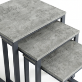[Concrete] Stackora set of 3 nest of tables top-down close-up showing light grey concrete-effect texture and subtle veining across all three surfaces