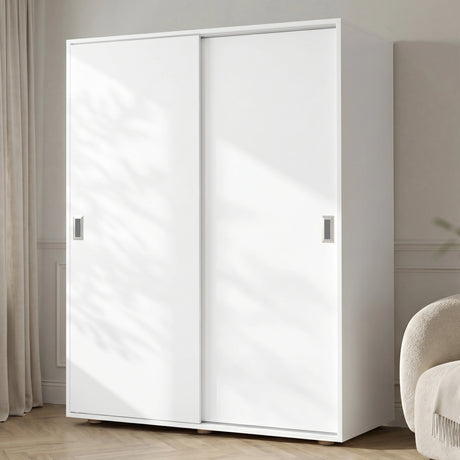 [Cool White] Torvek large sliding wardrobe fully closed angled view in bright neutral bedroom with sheer curtains