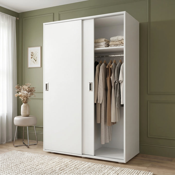 [Cool White] Torvek large sliding wardrobe side angled view in bright neutral bedroom with sheer curtains