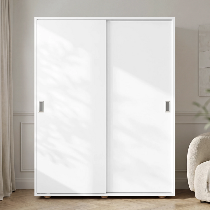 [Cool White] Torvek large sliding wardrobe fully closed front view in neutral bedroom with chrome recessed handles