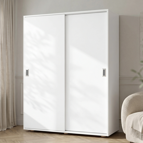 [Cool White] Torvek large sliding wardrobe fully closed angled view in bright neutral bedroom with sheer curtains
