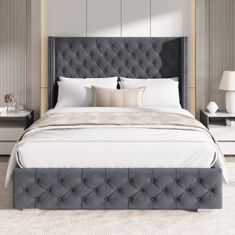 Front view of small double dark grey velvet ottoman bed with cross pattern and winged headboard in a modern bedroom.