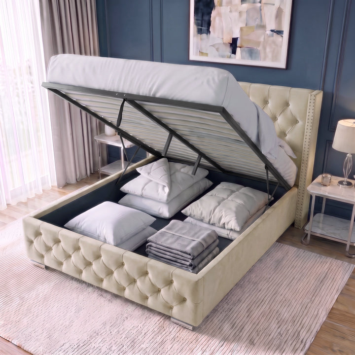 [Double | Beige] Open storage view of Cross ottoman bed showing lifted mattress platform and pillows packed in the base