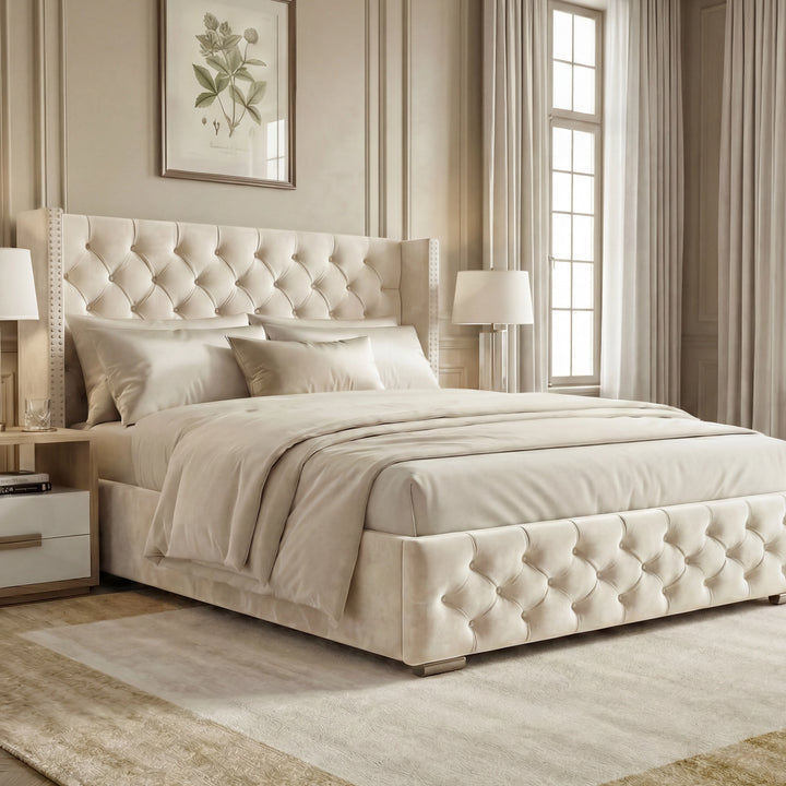 [King | Beige] Cross ottoman bed side-angle, diamond-tufted headboard and footboard on oak-tone flooring