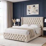 [King | Beige] Cross ottoman bed side-angle, diamond-tufted headboard and footboard on oak-tone flooring