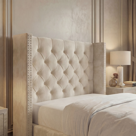 [Single | Beige] Detail shot of Cross ottoman bed headboard showing buttoned diamonds and nailhead studs
