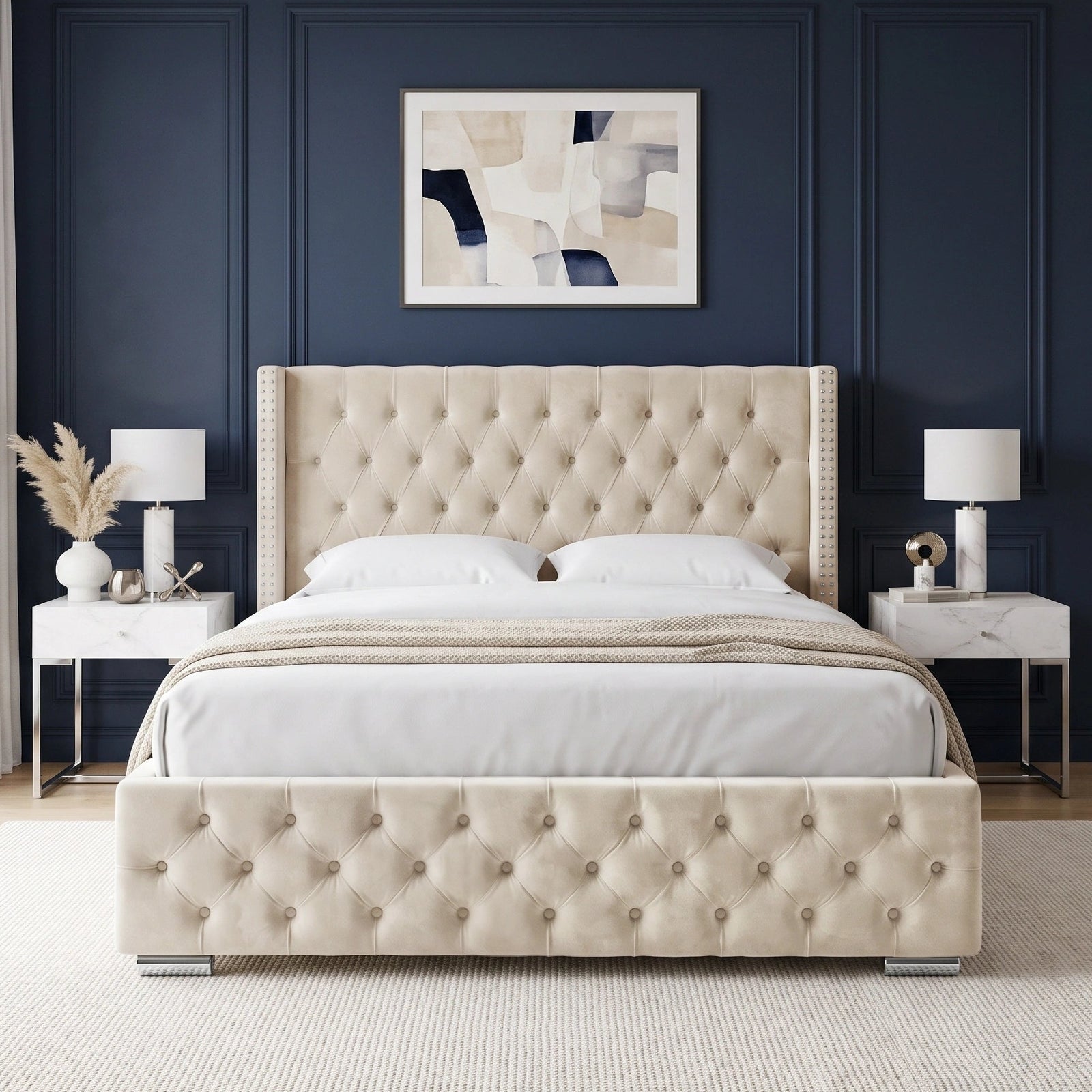 [King | Beige] modern upholstered bed frame with a high tufted headboard and matching footboard in a beige velvet, styled in a symmetrical bedroom with white bedding, matching nightstands, and lamps.