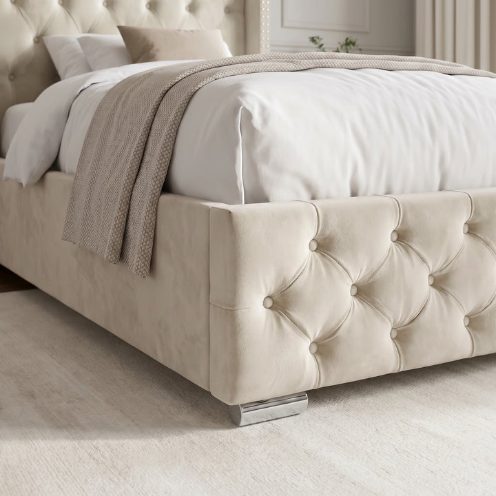 [Single | Beige] Detail shot of Cross ottoman bed footboard showing buttoned diamonds and metal legs