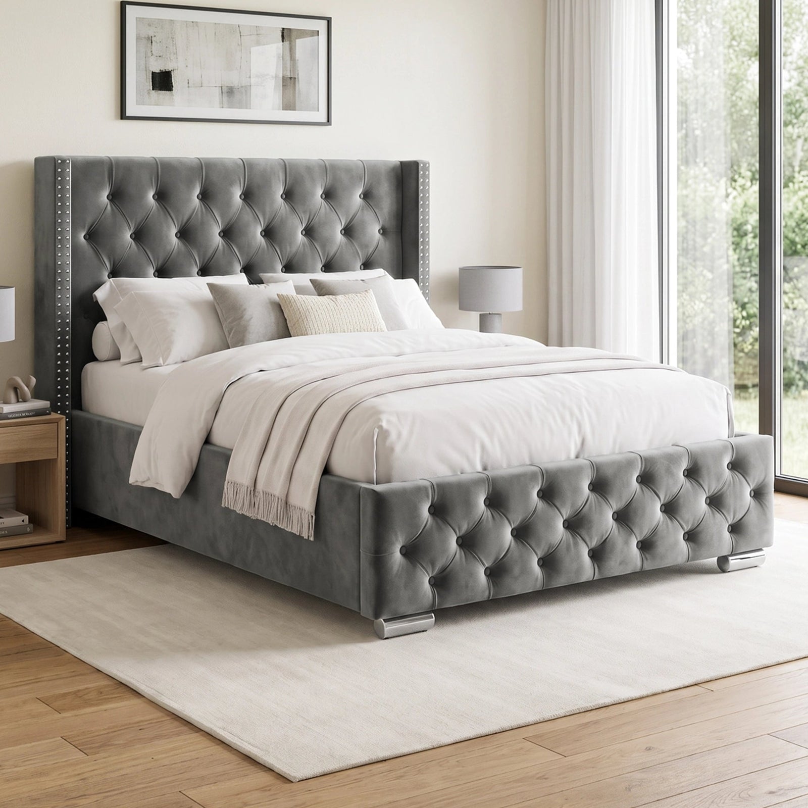 [Double | Grey] cross tufted velvet bed frame with silver nailhead trim and silver metal legs, styled in a bright bedroom with white bedding, a light rug, and wooden flooring.