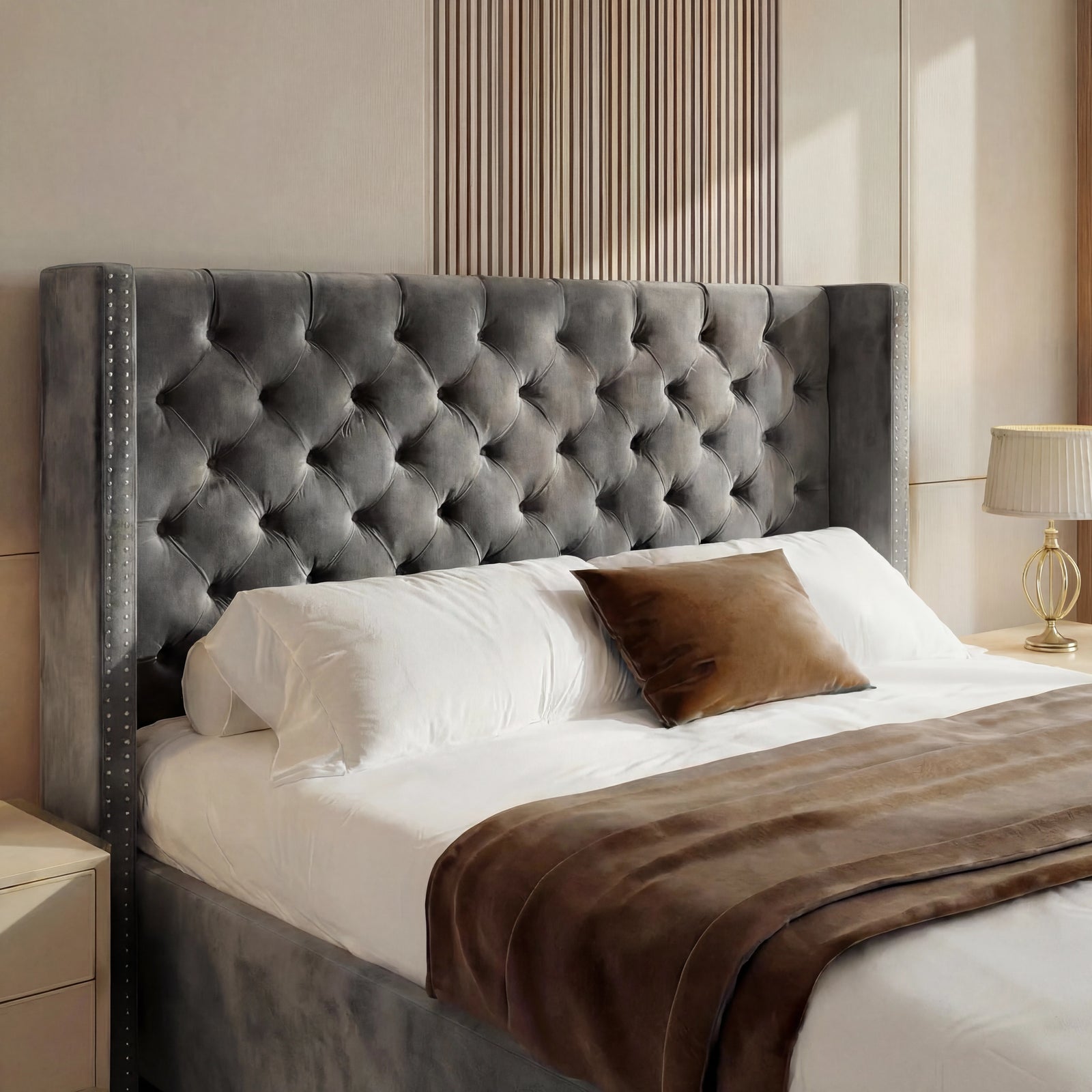[Double | Grey] Close view of Cross ottoman bed 110cm headboard, criss-cross tufting on grey velvet with studded wings