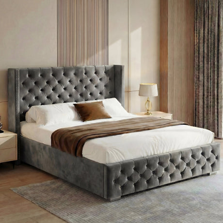 [King | Grey] Cross ottoman bed shown from side with tall buttoned wingback and matching tufted footboard