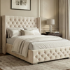 [Small Double | Beige] Side angle of Cross ottoman bed showing nailhead-studded wings and diamond-tufted base