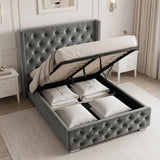 [Small Double | Grey] tufted velvet storage bed with the headboard and mattress lifted open to show the raised platform frame and bedding compartments, styled in a bright, modern bedroom.