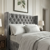 [Small Double | Grey] Headboard detail showing deep velvet buttoning with pillows and lamp beside