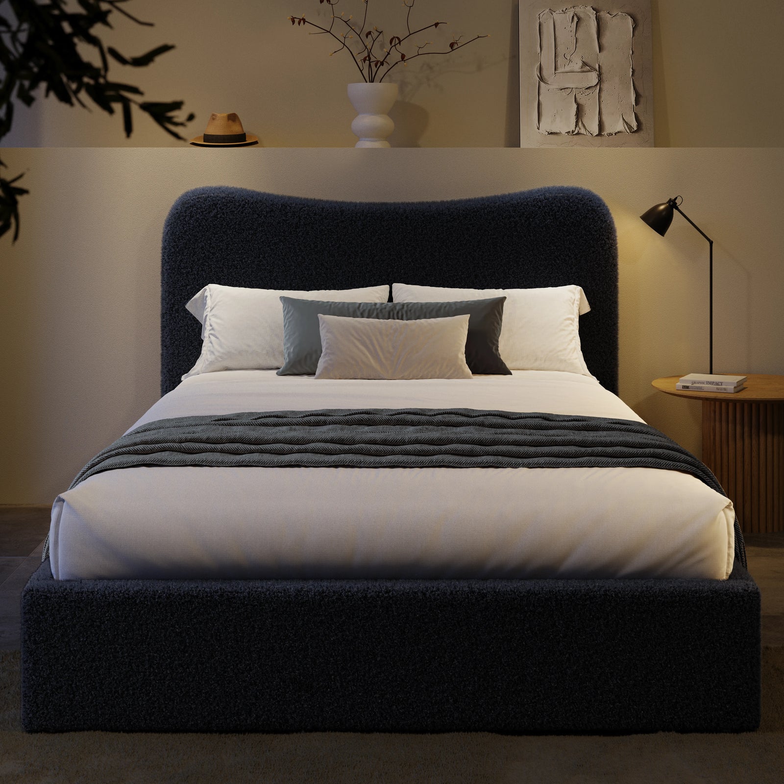 [Double | Blue] Front view of boucle ottoman bed with curved headboard in warm ambient evening lighting