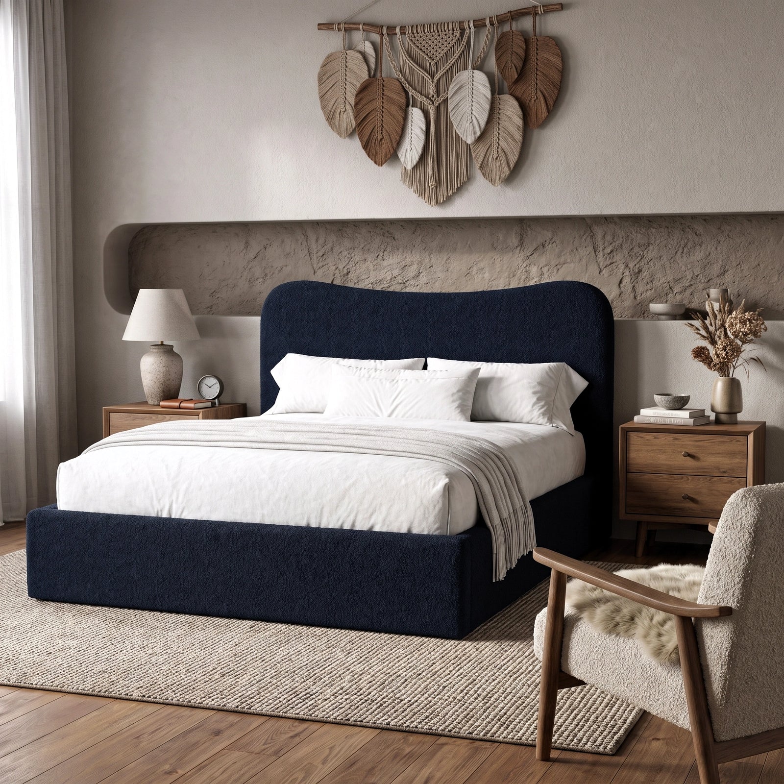 [Double | Blue] Boucle fabric ottoman bed from the side with white bedding and fringed throw beside floating shelf with art