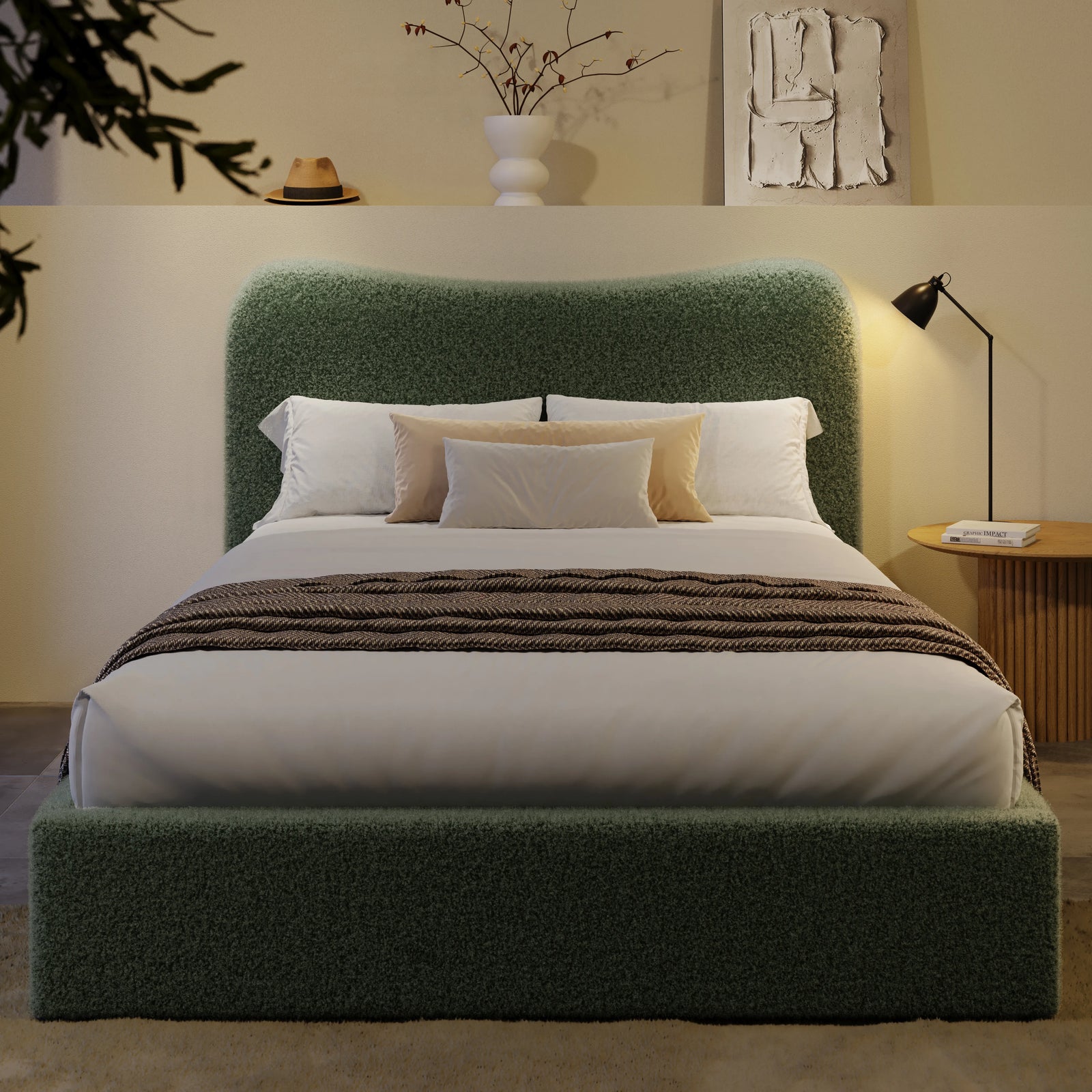 [Double | Light Green] Front view of boucle ottoman bed with curved headboard in warm ambient evening lighting