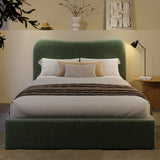 [Double | Sage Green] Front view of boucle ottoman bed with curved headboard in warm ambient evening lighting
