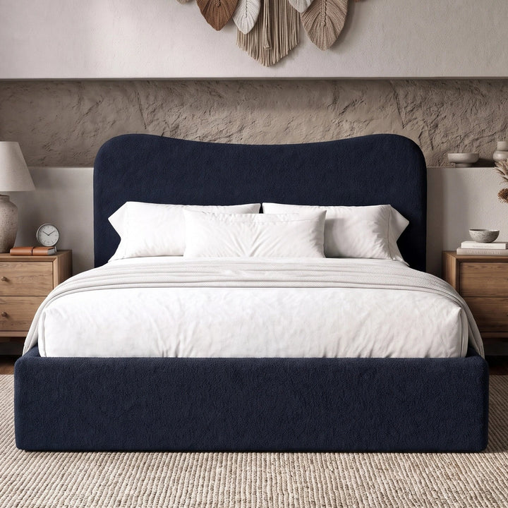 [King | Blue] Front view of boucle ottoman bed with curved headboard in bright day light