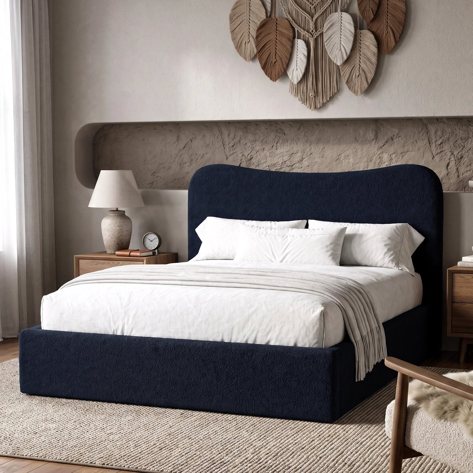 [King | Blue] Boucle fabric ottoman bed from the side with white bedding and fringed throw beside floating shelf with art
