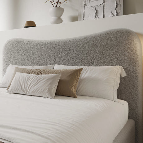 [King | Grey] Close-up of organic wave-shaped headboard showing boucle fabric texture with looped yarn detail