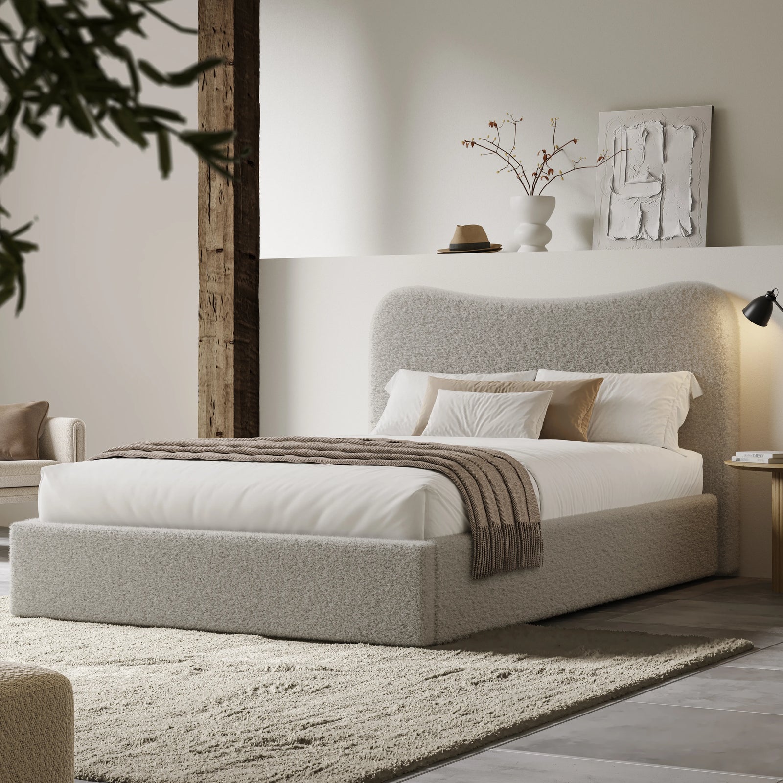 [King | Grey] Wide angle of boucle ottoman bed in loft room with reclaimed timber beam and floating shelf with art