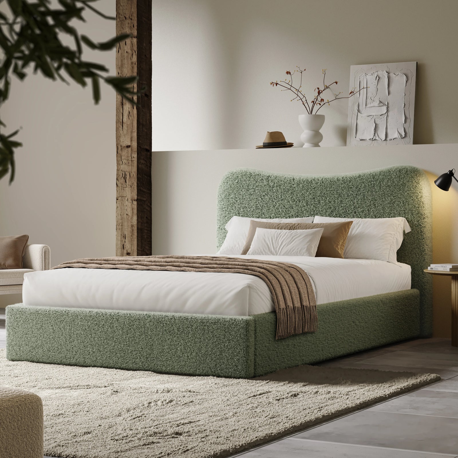 [King | Light Green] Wide angle of boucle ottoman bed in loft room with reclaimed timber beam and floating shelf with art