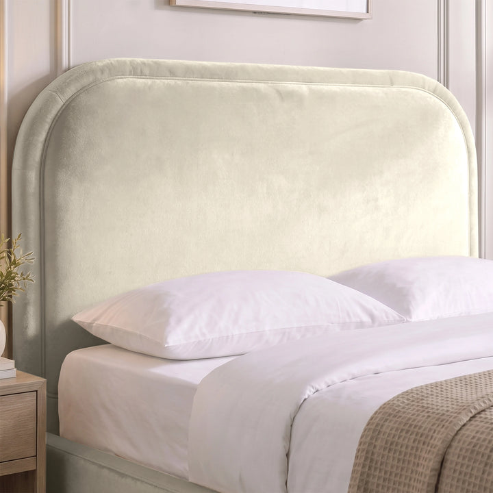 [Beige | Double] Close-up of plush padded curved headboard with raised border piping that keeps its shape