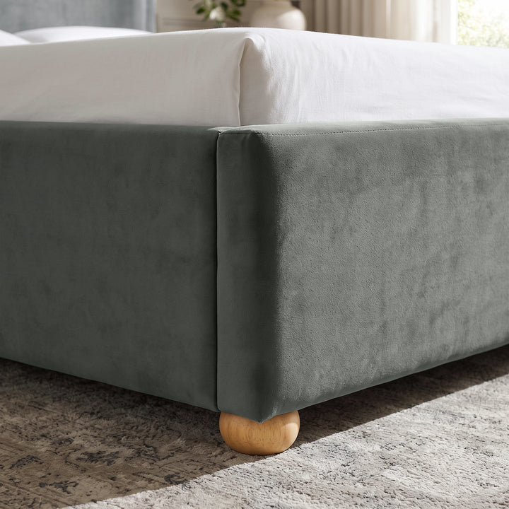 [Grey | Double] Close-up of plush upholstered base corner with rounded solid wood foot and soft curved edge